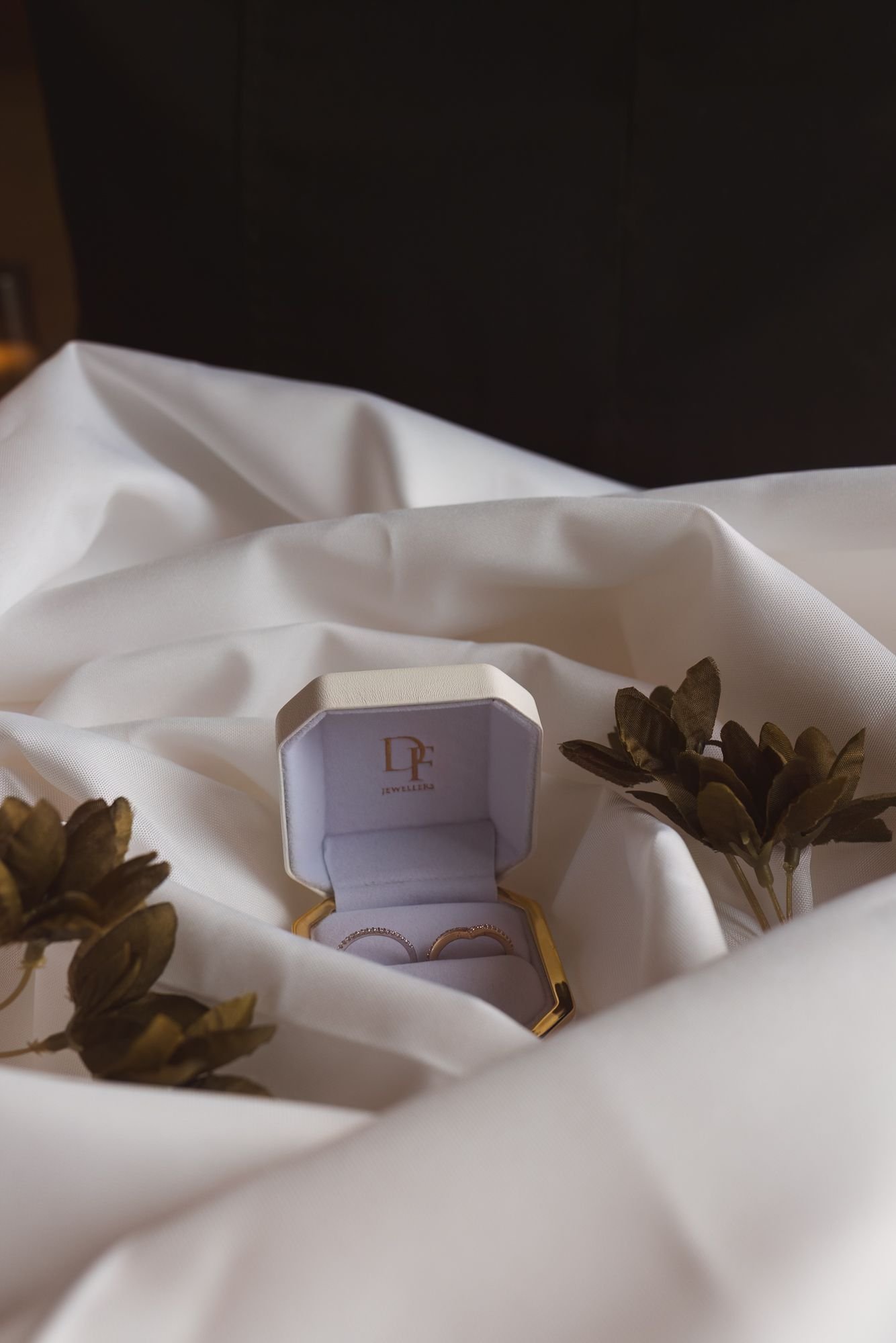 Elegant wedding rings and bridal accessories close up